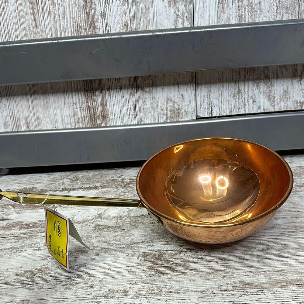 Copper pan or decorative bowl.